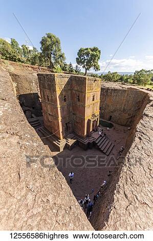 Stock Photograph - Biete Ghiorgis (House of Saint George) Ethiopian Orthodox underground monolith rock-cut church, Rock-Hewn Churches; Lalibela, Amhara Region, Ethiopia. Fotosearch
