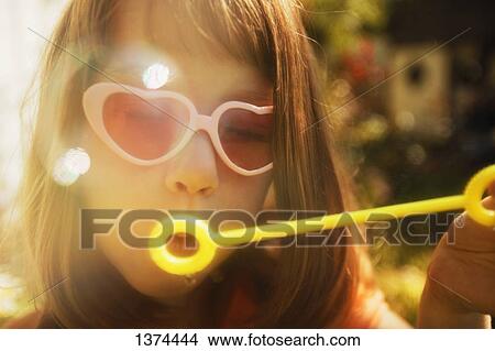 Blowing bubbles View Large Photo Image Picture - Blowing bubbles. Fotosearch