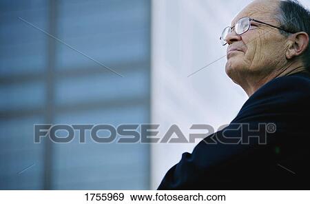 Businessman deep in thought View Large Photo Image Stock Photo - Businessman deep in thought. Fotosearch