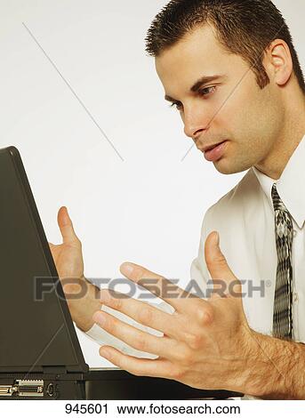 Stock Image - Businessman in confusion. Fotosearch