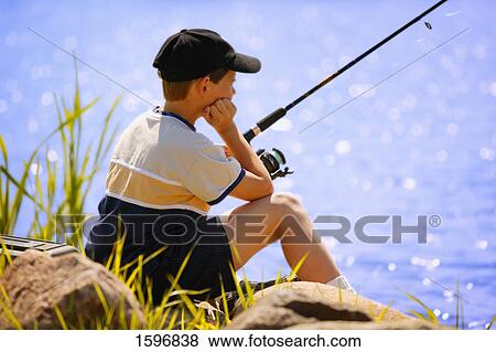 Stock Photo - Child fishing. Fotosearch