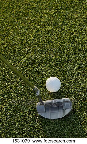 Stock Photo - Closeup of putter and ball. Fotosearch