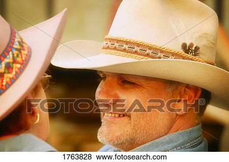 Stock Photo - Couple look at each other. Fotosearch