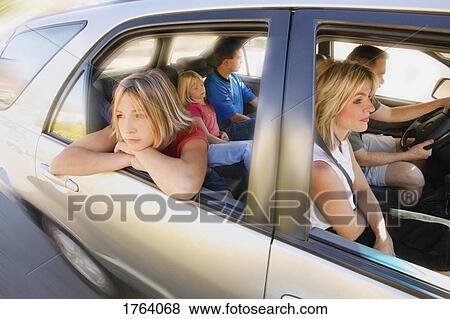 Family in a car View Large Photo Image Stock Photo - Family in a car. Fotosearch