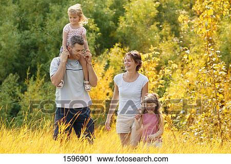 Family walk View Large Photo Image Stock Image - Family walk. Fotosearch
