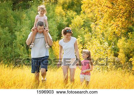 Family walks together View Large Photo Image Stock Image - Family walks together. Fotosearch