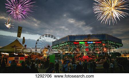 Fireworks at an amusement park View Large Photo Image Stock Photograph - Fireworks at an amusement park. Fotosearch