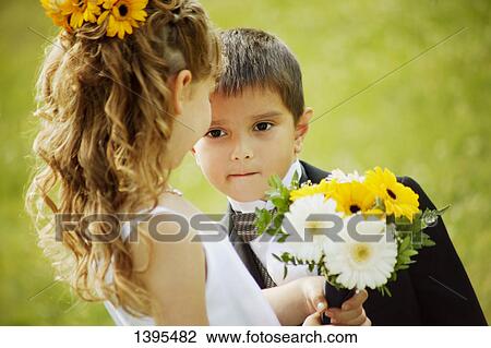 Flower girl and ring bearer View Large Photo Image Stock Image - Flower girl and ring bearer. Fotosearch