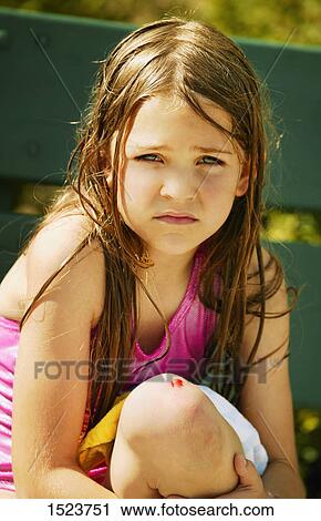 Girl scraped her knee View Large Photo Image Stock Image - Girl scraped her knee. Fotosearch