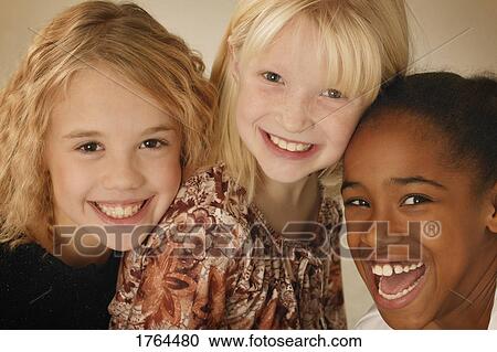 Girls smile View Large Photo Image Stock Image - Girls smile. Fotosearch