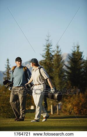 Golfers' discussion View Large Photo Image Stock Image - Golfers' discussion. Fotosearch