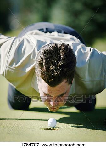 Stock Photo - Helping the ball. Fotosearch