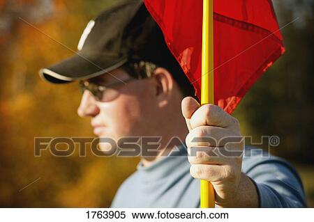 Holding the flag View Large Photo Image Stock Photography - Holding the flag. Fotosearch