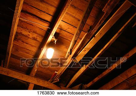 Stock Image - Light bulb on the ceiling. Fotosearch