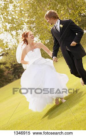 Married couple go for a run View Large Photo Image Stock Photography - Married couple go for a run. Fotosearch