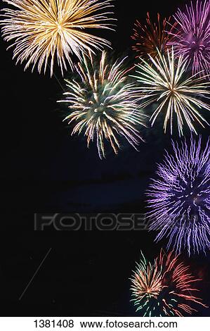 Stock Photo - Multicolored fireworks. Fotosearch