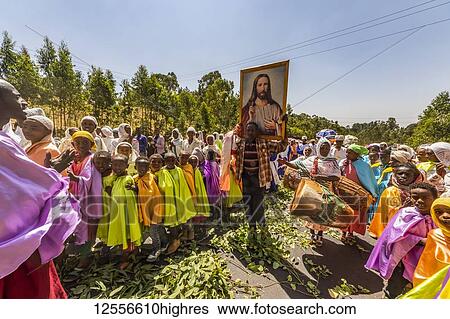 Stock Photograph - People in a Timkat procession during the Orthodox Tewahedo celebration of Epiphany, celebrated on January 19th; Sodo, Southern Nations Nationalities and Peoples' Region, Ethiopia. Fotosearch