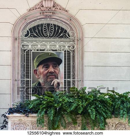 Stock Photograph - Portrait of Fidel Castro in a window; Havana, Cuba. Fotosearch