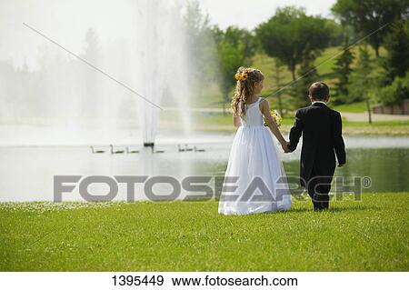 Stock Photo - Ring barer and flower girl. Fotosearch
