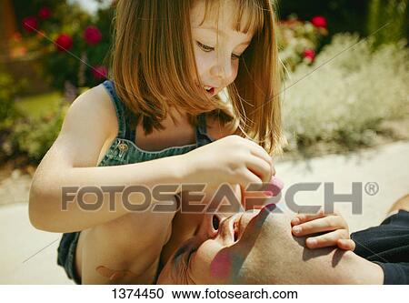 Stock Image - Sidewalk chalk on daddy's chin?. Fotosearch