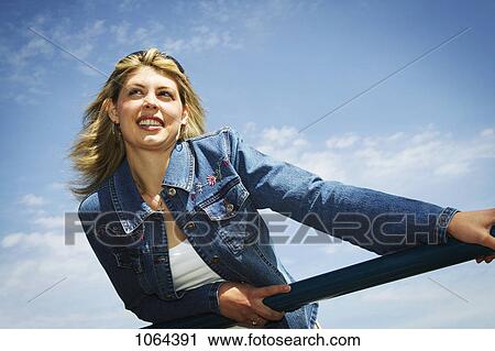 Stock Image - Smiling woman. Fotosearch