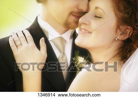 Snuggle on wedding day View Large Photo Image Picture - Snuggle on wedding day. Fotosearch