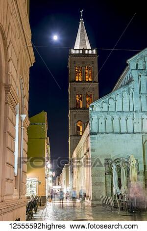 Stock Photograph - St Anastasia's Cathedral Tower and full moon over Zadar; Zadar, Croatia. Fotosearch