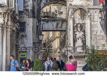Stock Photograph - St Antoine sculpture on the Ciprianis-Benedetti Palace in Nardoni Trg in the Old City; Split, Croati. Fotosearch
