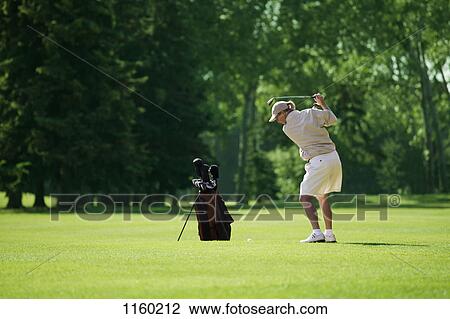 Swing on the fairway View Large Photo Image Stock Image - Swing on the fairway. Fotosearch