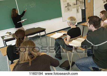 Picture - Teacher instructing class. Fotosearch