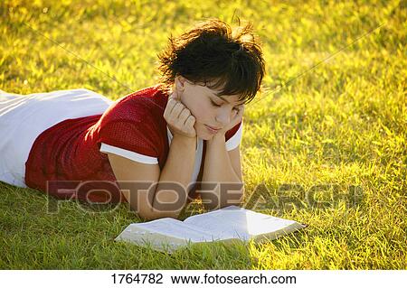 Teenager reads her Bible View Large Photo Image Stock Image - Teenager reads her Bible. Fotosearch