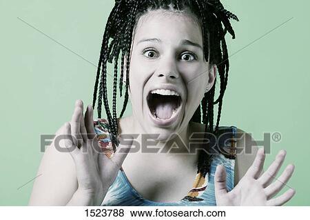 Teenager screams View Large Photo Image Stock Photo - Teenager screams. Fotosearch