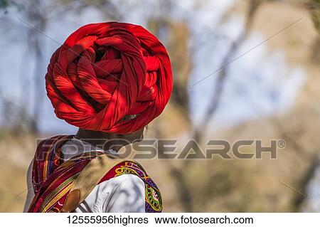 Stock Photograph - The traditional headwear and clothing by the men in the Jawai region of Northern India; Rajasthan, India. Fotosearch