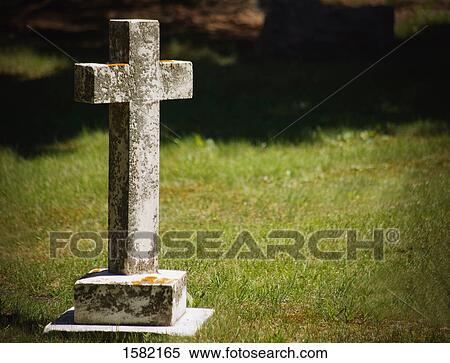 Stock Photography - Tombstone stands tall. Fotosearch