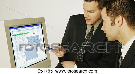 Stock Photography - Two men in a meeting. Fotosearch