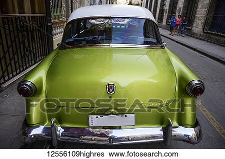 Stock Photograph - Vintage car on the streets of Havana; Havana, Cuba. Fotosearch