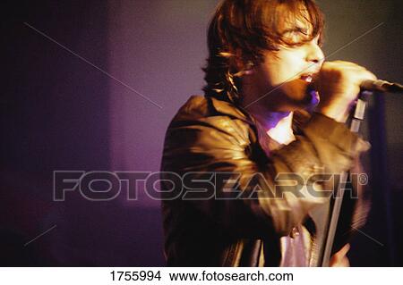 Picture - Vocalist performs. Fotosearch