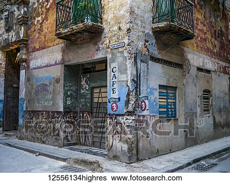 Weathered facade of residential building with advertising on the wall; Havana, Cuba View Large Photo Image Stock Photograph - Weathered facade of residential building with advertising on the wall; Havana, Cuba. Fotosearch