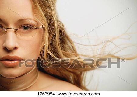 Woman with trendy glasses View Large Photo Image Picture - Woman with trendy glasses. Fotosearch