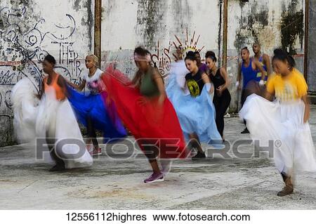Young Cuban women dancing in an old concrete building with graffiti on the walls; Havana, Cuba View Large Photo Image Stock Photograph - Young Cuban women dancing in an old concrete building with graffiti on the walls; Havana, Cuba. Fotosearch