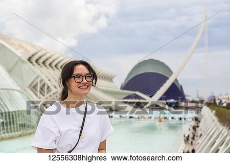 Young female tourist at City of Arts and Sciences; Valencia, Spain View Large Photo Image Stock Photograph - Young female tourist at City of Arts and Sciences; Valencia, Spain. Fotosearch