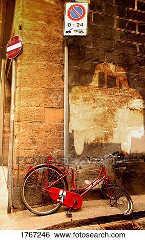 A bicycle parked by a "No Parking" sign View Large Photo Image Stock Photograph - A bicycle parked by a "No Parking" sign. Fotosearch