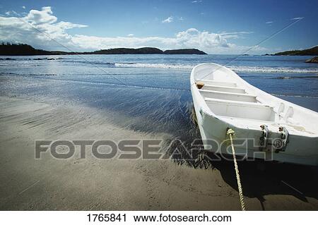 A boat in a lake View Large Photo Image Stock Image - A boat in a lake. Fotosearch