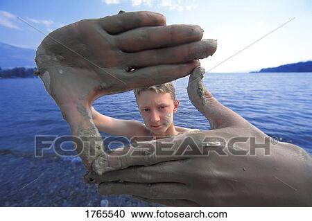 A boy in the water View Large Photo Image Stock Image - A boy in the water. Fotosearch