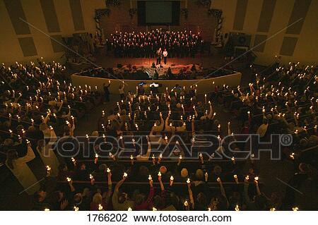 Stock Image - A candlelight service. Fotosearch