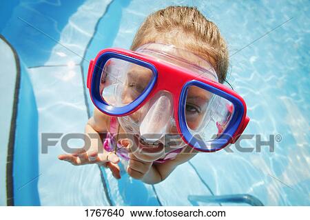 Stock Image - A child with goggles. Fotosearch
