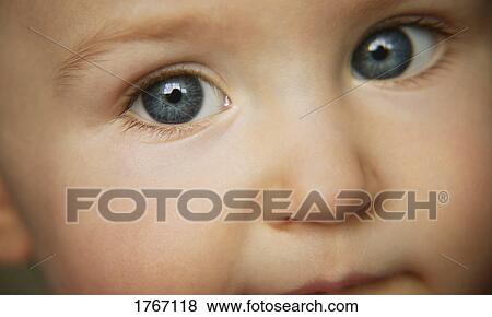 Stock Photo - A child's eyes. Fotosearch