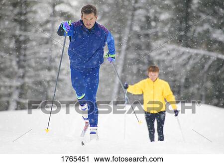 A couple of cross country skiers View Large Photo Image Stock Image - A couple of cross country skiers. Fotosearch