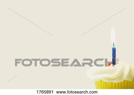 A cupcake with a candle View Large Photo Image Stock Image - A cupcake with a candle. Fotosearch