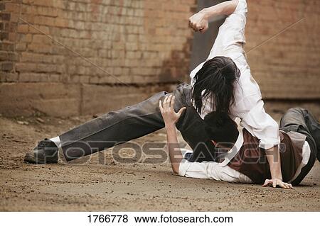 A fist fight View Large Photo Image Stock Photo - A fist fight. Fotosearch
